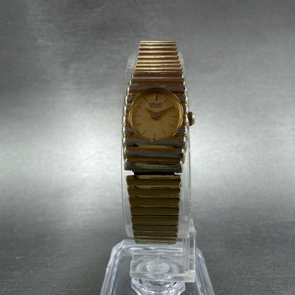 Seiko Watch Women 14mm Champagne Dial Gold Tone Rectangle 1E20-5099 New Battery5