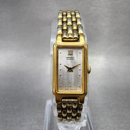Seiko Tank Watch Women 13mm Silver Tone Gold Tone Rectangle 2e206859 NewBattery0