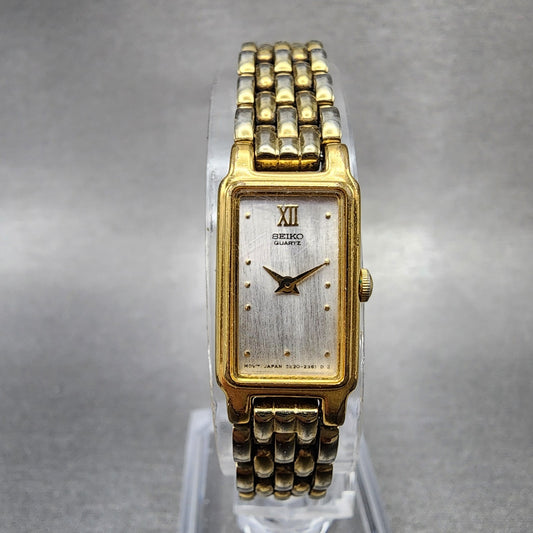 Seiko Tank Watch Women 13mm Silver Tone Gold Tone Rectangle 2e206859 NewBattery0