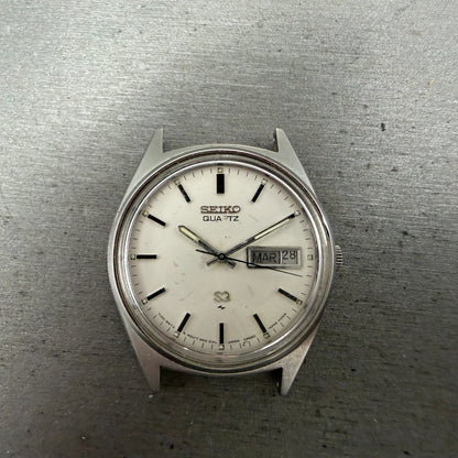 Seiko SQ Watch Men 35mm Silver Dial Silver Tone Daydate Round 7123-8429 PARTS0