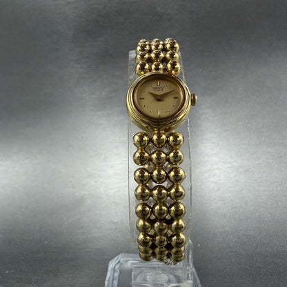 Seiko Watch Women 16mm Champagne Dial Gold Tone Round 1E20-0329 New Battery5