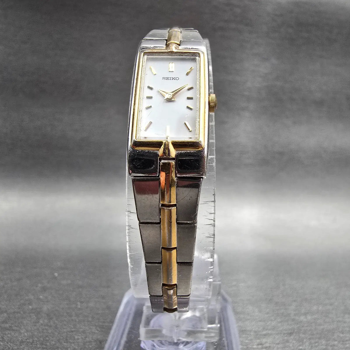 Seiko Watch Women 13mm White Dial Two Tone Rectangle 2E20-7479 New Battery JP2175