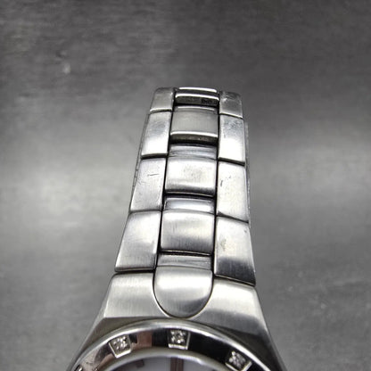 Citizen Eco-Drive Watch Women 25mm White Dial Silver Tone Date E011-S033705 RunP4