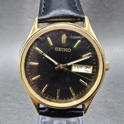 Seiko Watch Men 35mm Black Dial Gold Tone Daydate READ!!!! 7N43-8A99 New Battery0
