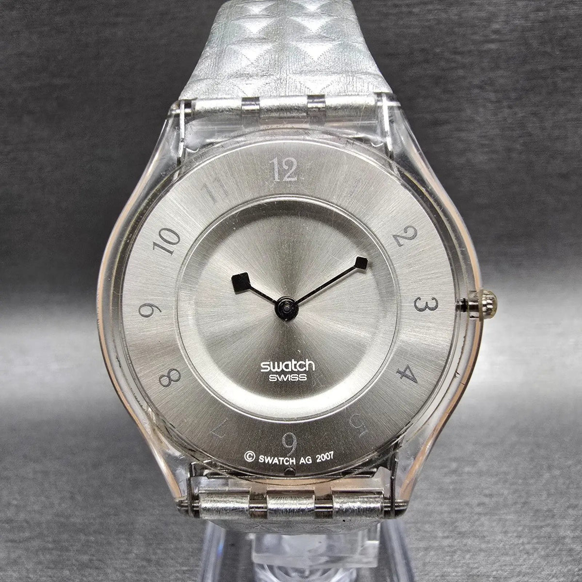 Swatch Skin Facet Glam Watch Women 34mm Silver Dial Clear Case SFK312 New Batt1