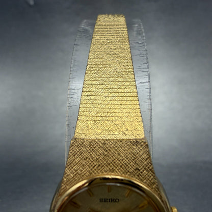 Seiko watch Women 19mm Champagne Dial Gold Tone Round V401-1819 New Battery HJ84
