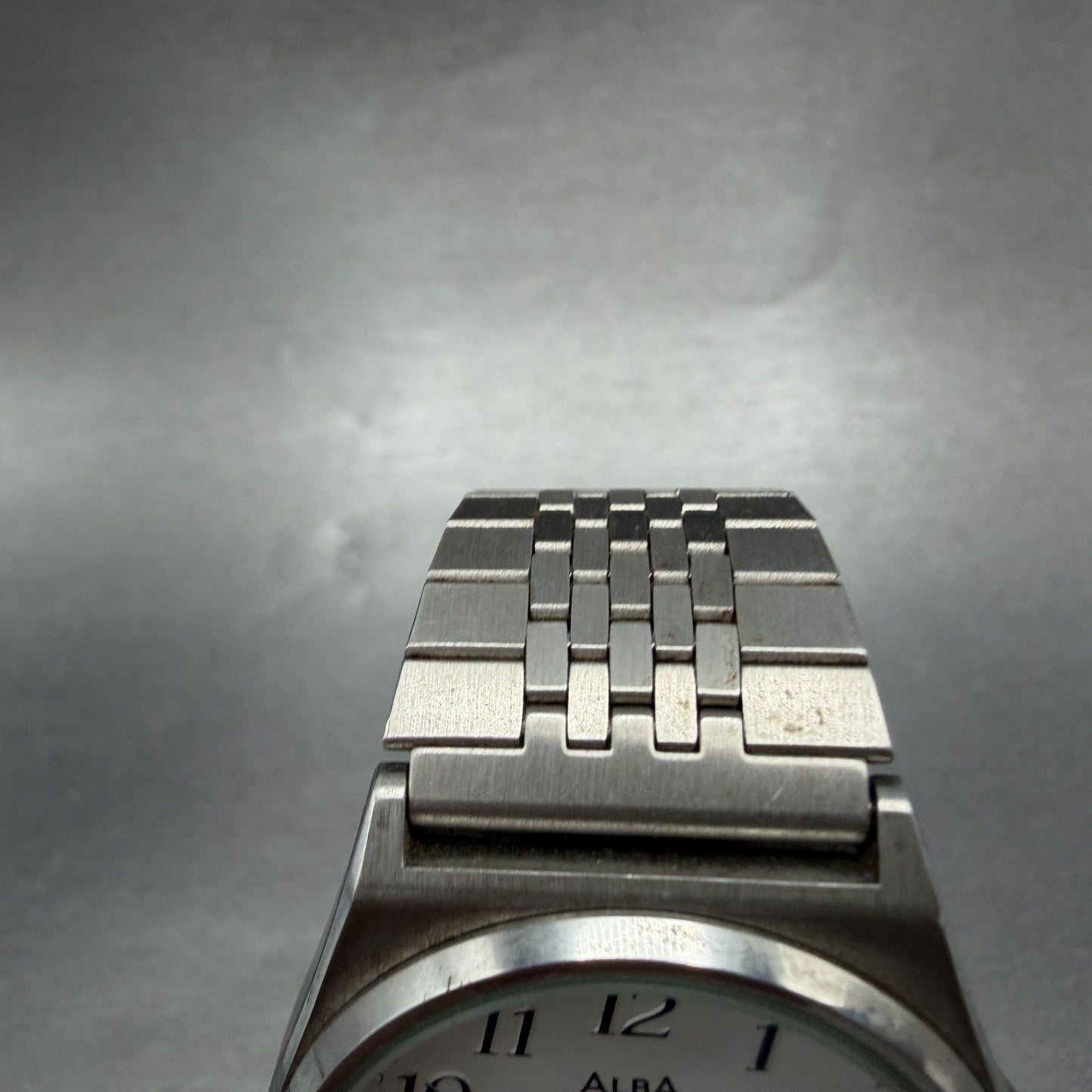 Seiko ALBA Watch Men 35mm Silver Dial Silver Tone Daydate V743-8A10 New Batt M404