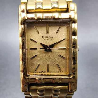 Seiko Tank Watch Women 16mm Gold Dial Gold Tone Rectangle 1N015A69 New Battery1