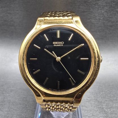 Seiko Watch Women 34mm Black Dial Gold Tone Round V701-6K69 New Battery0