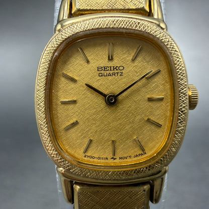 Seiko Watch Women 17mm Champagne Dial Gold Tone Rectangle 2Y00-5028 New Battery61