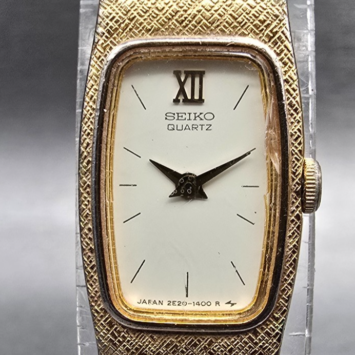Seiko Watch Women 13mm Ivory Dial Gold Tone Rectangle 2E20-6139 New Battery1
