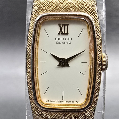 Seiko Watch Women 13mm Ivory Dial Gold Tone Rectangle 2E20-6139 New Battery1