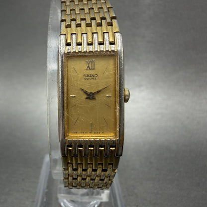 Seiko Tank Watch Women 13mm Champagne Dial Gold Tone 2E20-6700 New Battery0
