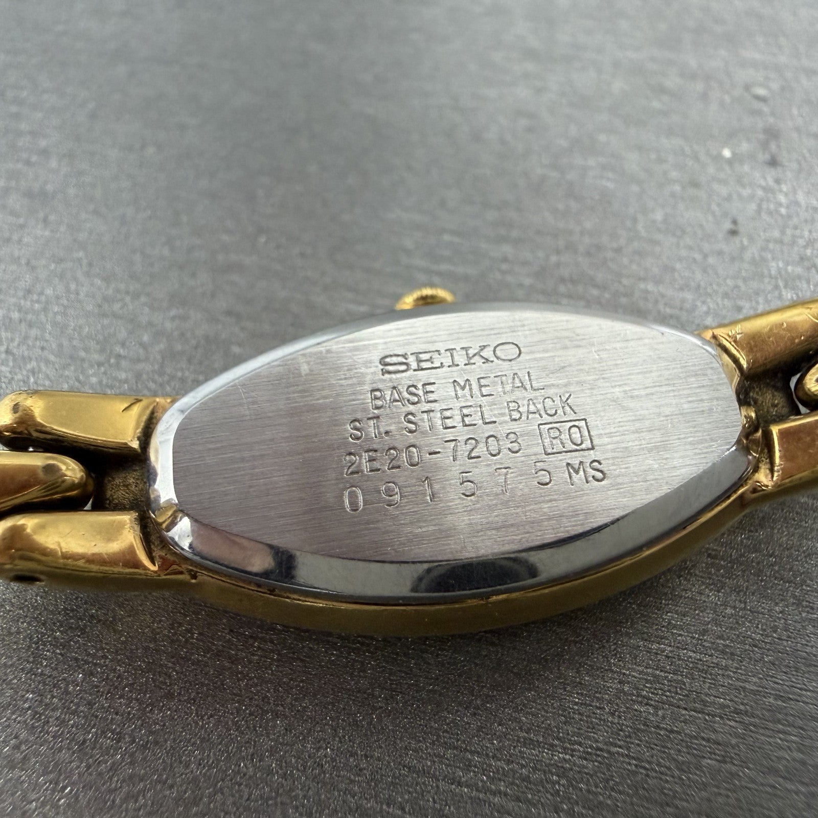 Seiko Watch Women 15mm Silver Dial Gold Tone Oval 2E207203 New Battery9
