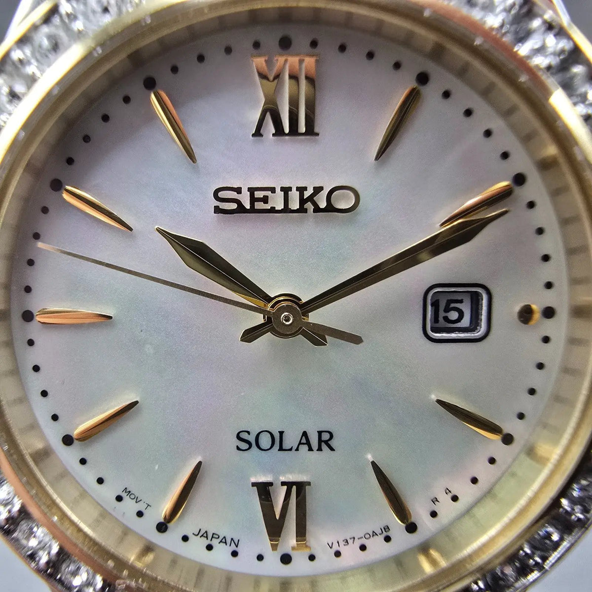Seiko Solar Watch Women 28mm MOP Dial Two Tone Date Gemmed V137-0AA0 Works JP 671