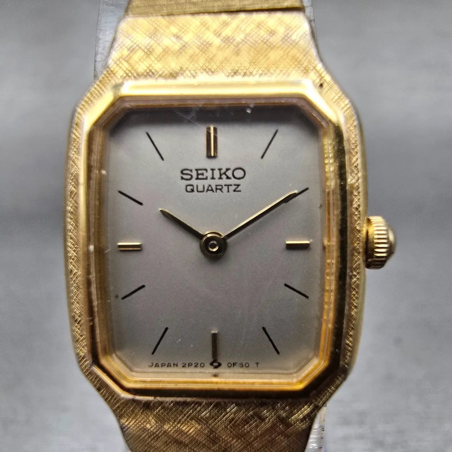 Seiko Watch Women 17mm Silver Dial Gold Tone Rectangle 2P20-5D39 New Battery VTG1