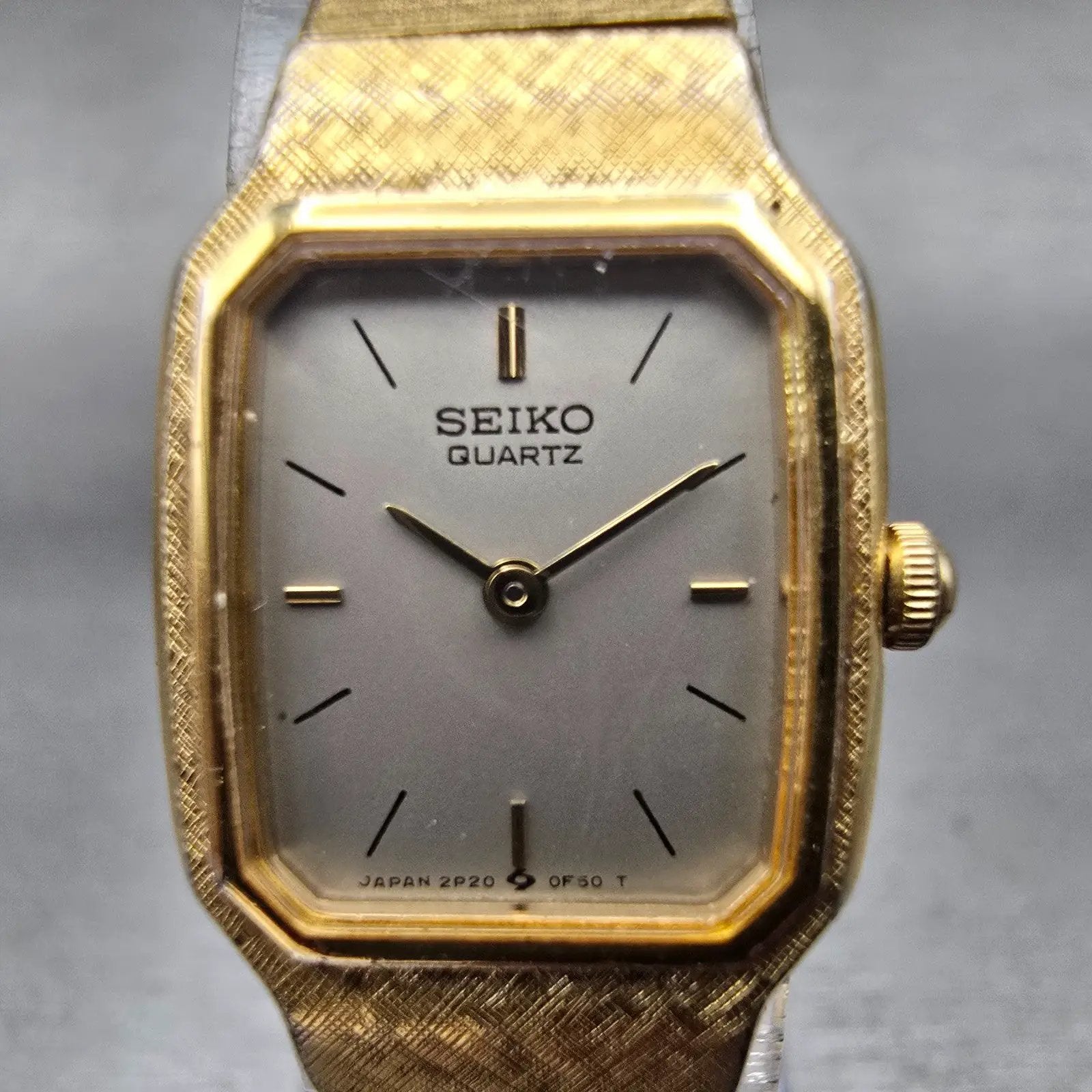 Seiko Watch Women 17mm Silver Dial Gold Tone Rectangle 2P20-5D39 New Battery VTG1