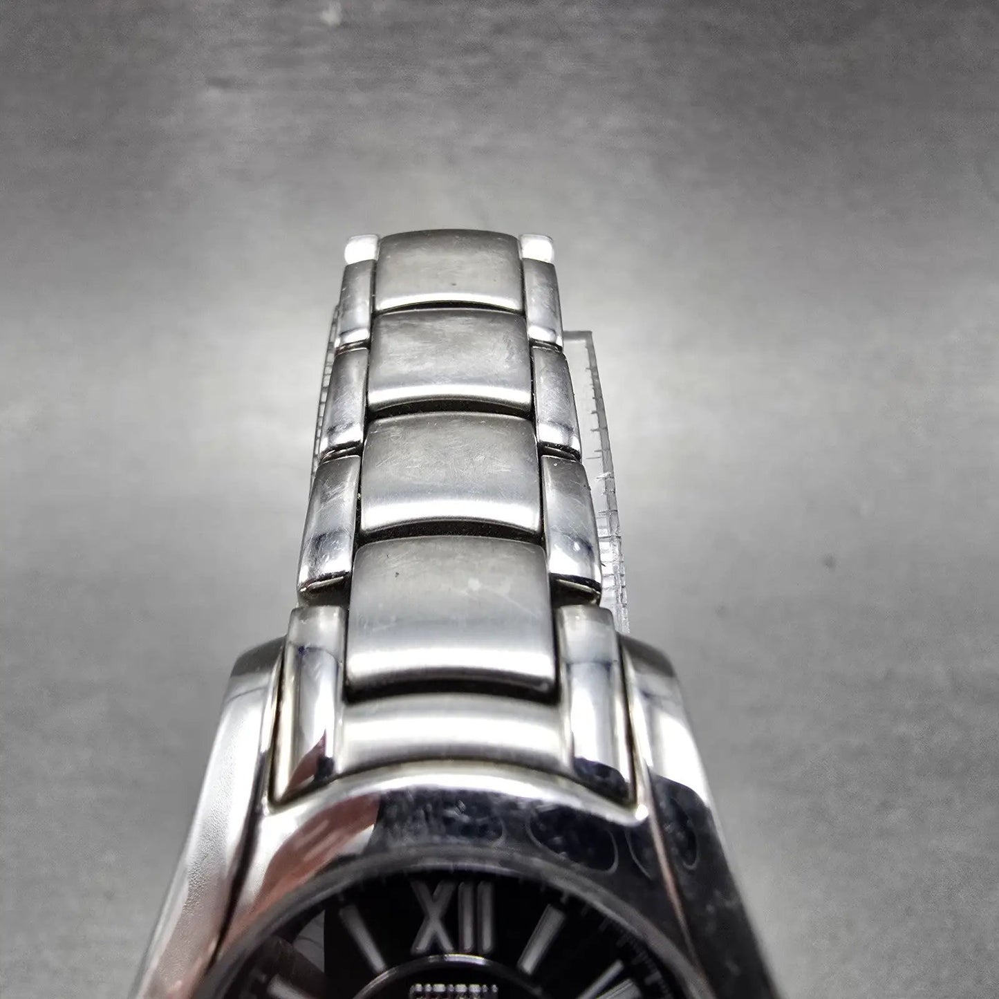 Citizen Watch Women 25mm Black Dial Silver Tone Date Round E011-S015502 Runs4