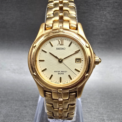 Seiko Watch Women 25mm Champagne Dial Gold Tone Date Round 7N82-0599 New Batt JP0