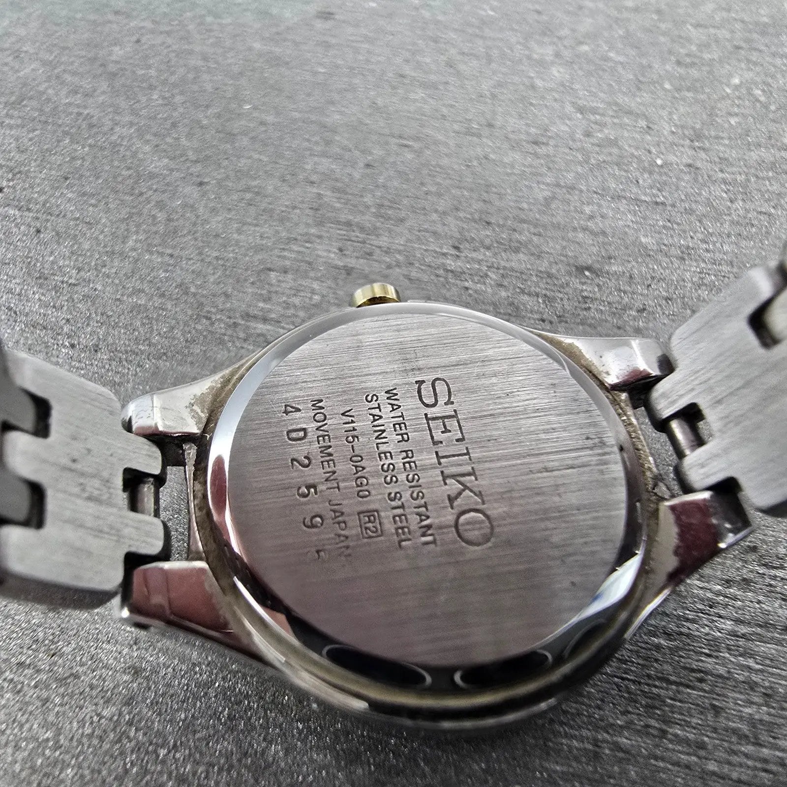 Seiko Solar Watch Women 22mm White Dial Two Tone Round V115-0AG0 Runs9