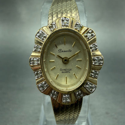 Armitron Deaville Watch Women 19mm Champagne Dial Gold Tone Oval New Battery0