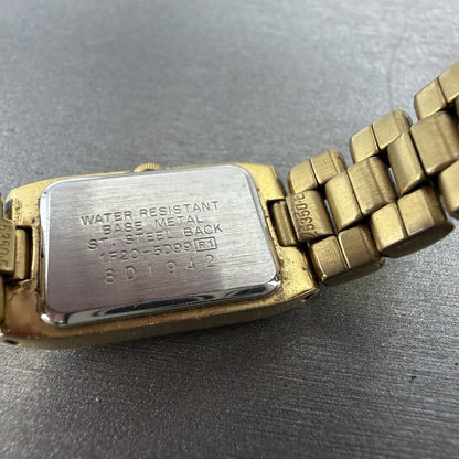 Seiko Tank Watch Women 15mm Champagne Dial Gold Tone Rectangle 1F20-5D99 New Bat9