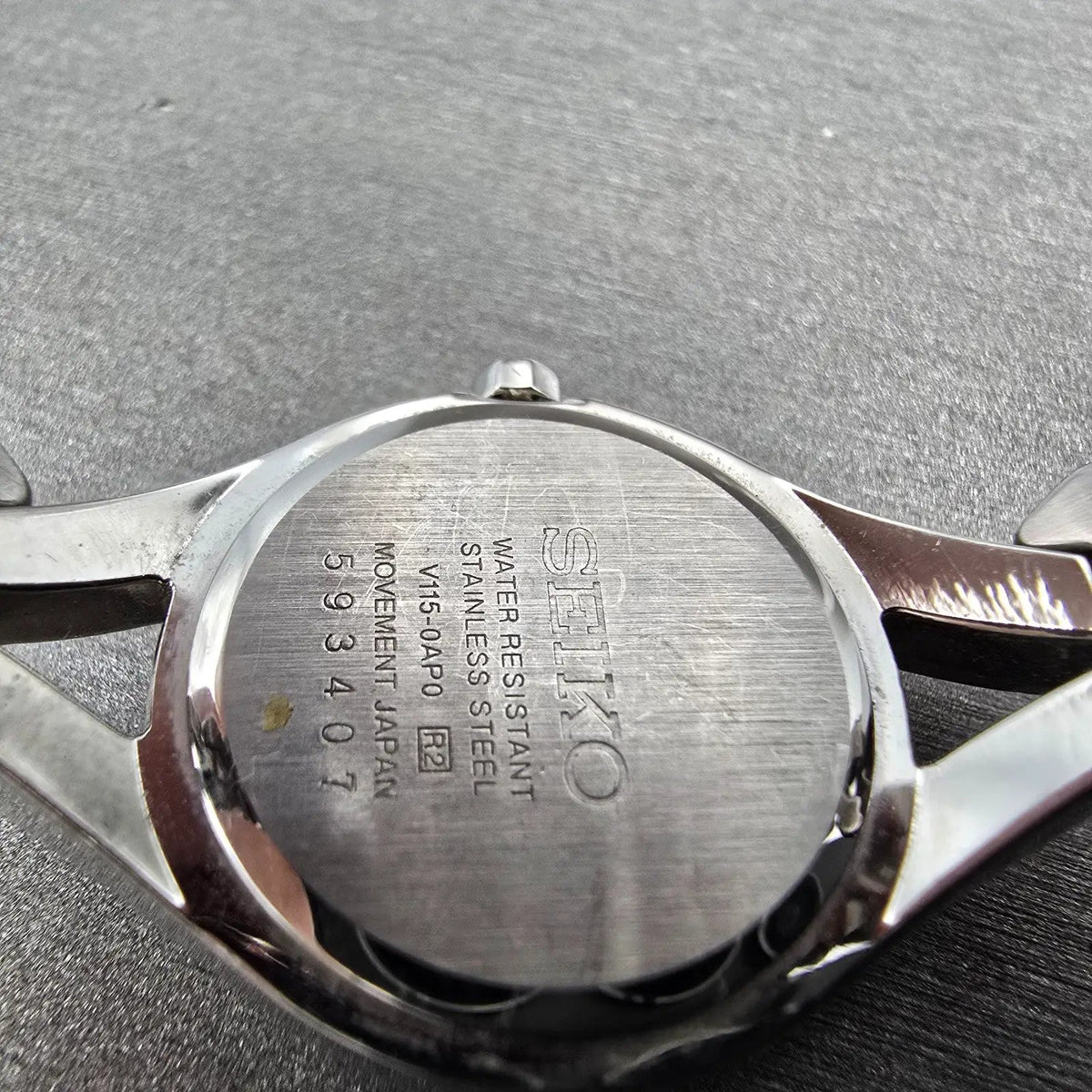 Seiko Solar Watch Women 23mm MOP Dial Silver Tone Round Crystal Bezel Runs9