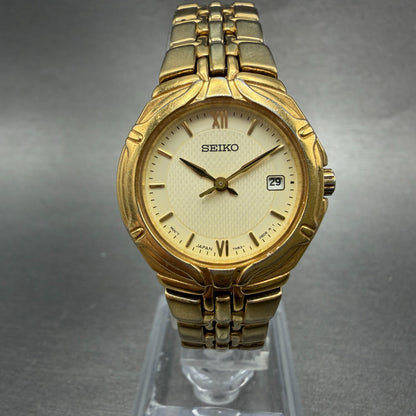 Seiko Watch Women 26mm Champagne Dial Gold Tone Date Round 7n82-0at0 New Battery0