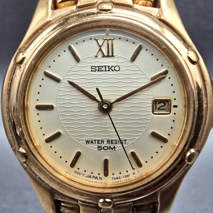 Seiko Watch Women 25mm Champagne Dial Gold Tone Date Round 7N82-0599 New Batt JP1
