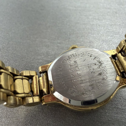 Seiko Watch Women 19mm White Dial Gold Tone Round V401-0289 New Battery OIHUGY9