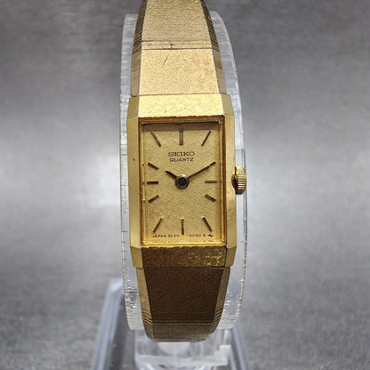Seiko Tank Watch Women 12mm Gold Dial Gold Tone Rectangle 2E205029 New Battery0