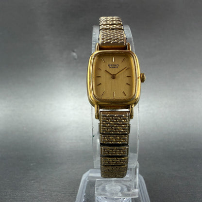 Seiko Watch Women 18mm Champagne Dial Gold Tone Rectangle 1N00-5K29 New Battery55