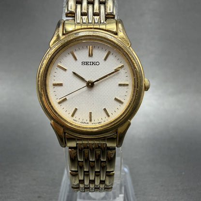 Seiko Watch Women 25mm White Dial Gold Tone Round V7011930 New Battery0