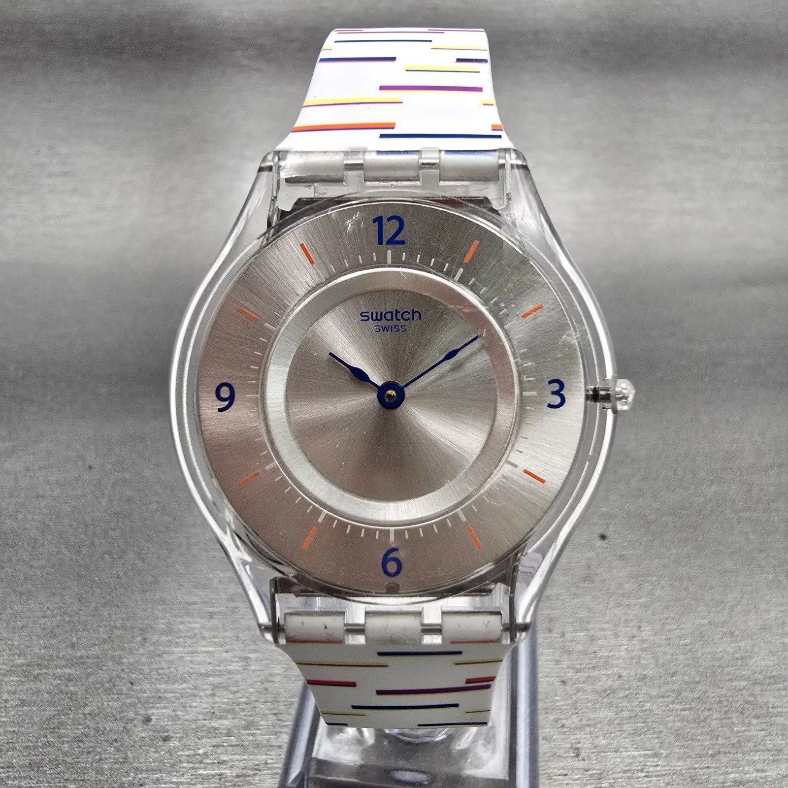 Swatch THIN LINER Watch Men Silver Dial Clear Case Round SFE108 New Battery0