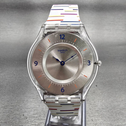 Swatch THIN LINER Watch Men Silver Dial Clear Case Round SFE108 New Battery0