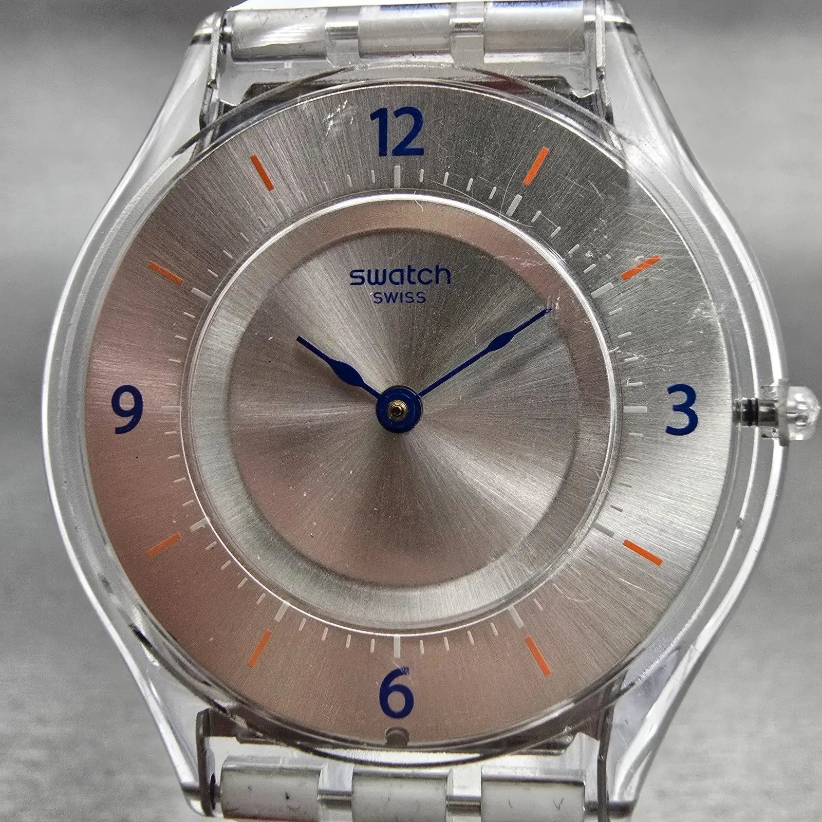 Swatch THIN LINER Watch Men Silver Dial Clear Case Round SFE108 New Battery1