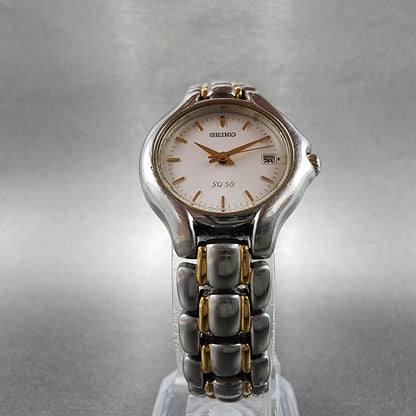 Seiko SQ 50 Watch Women 25mm White Dial Two Tone Date 7n820301 New Battery6