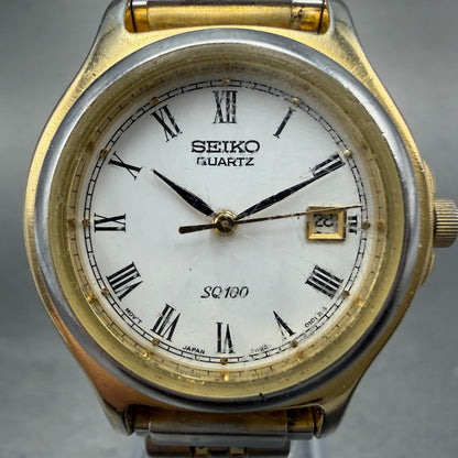 Seiko SQ 100 Watch Women 28mm White Dial Gold Tone Date 7N82-0061 New Battery1