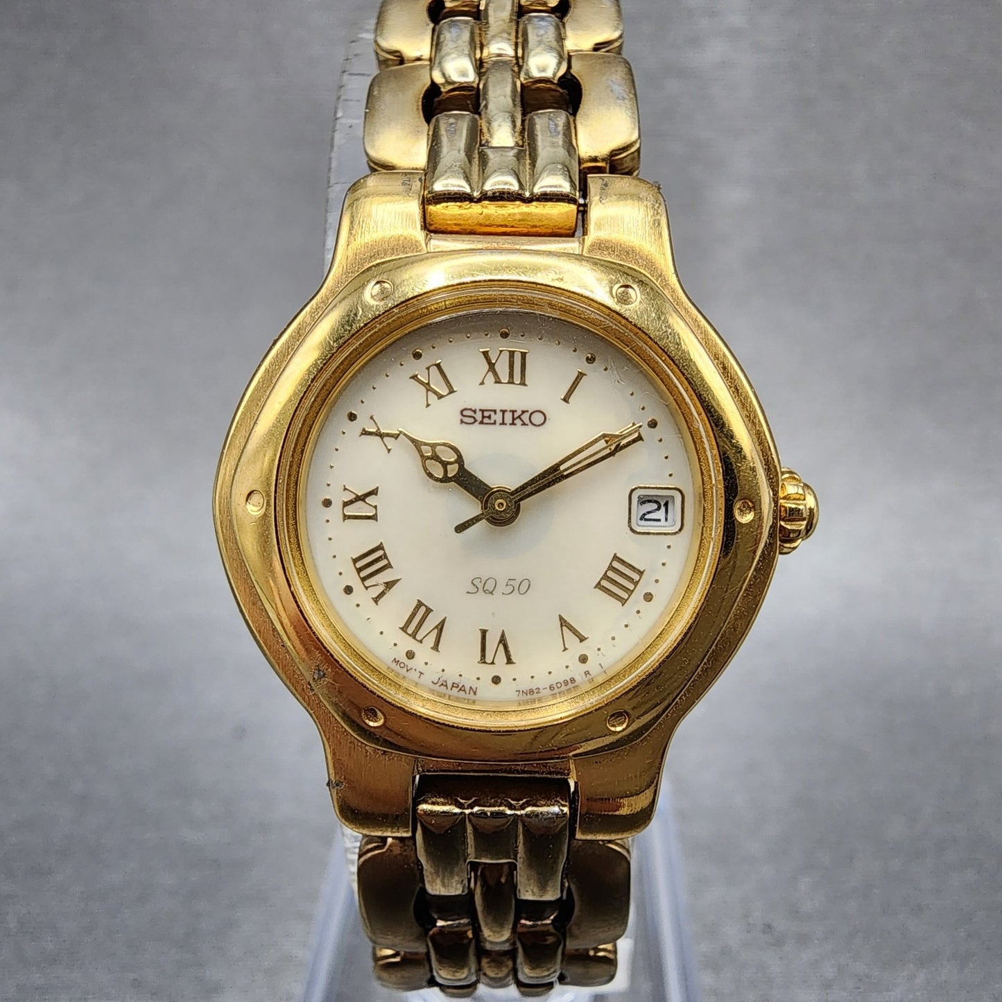Seiko SQ 50 Watch Women 25mm White Dial Gold Tone Date Round 7N826C53 New Batt0