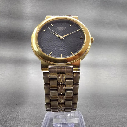 Seiko SX Watch Men 33mm Black Dial Gold Tone Round V701-1K00 New Battery Vintage5
