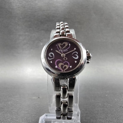 Seiko Solar Heart Watch Women 22mm Purple Dial Silver Tone Round V117-0BB0 Runs5