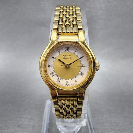 Seiko Watch Women 19mm White Dial Gold Tone Round V4010289 New Battery0