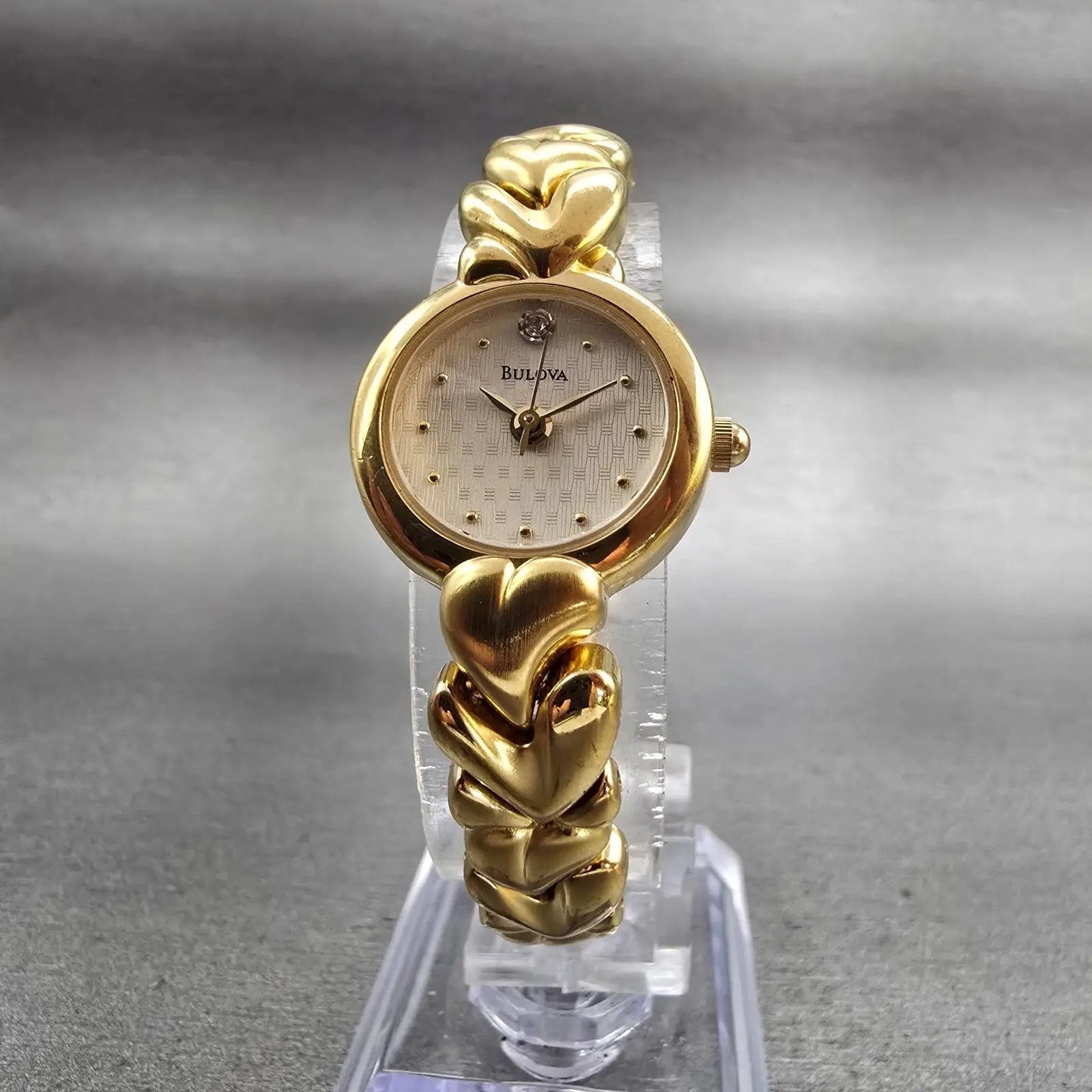 Bulova Watch Women 20mm Cream Dial Gold Tone Round Hearts 97S59 New Battery5