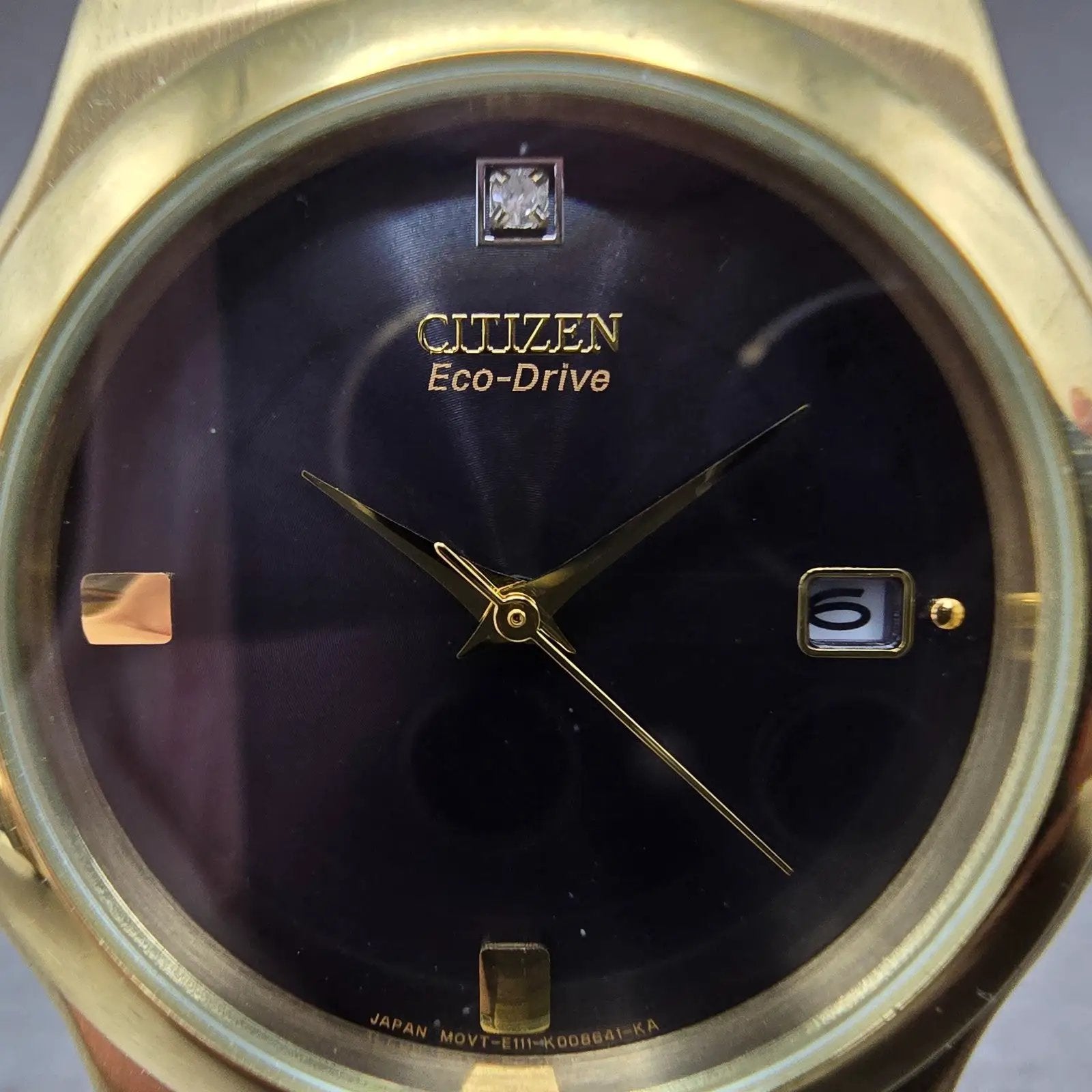 Citizen Eco-Drive Watch Men 37mm Black Dial Gold Tone Date E111-K005825 PARTS2
