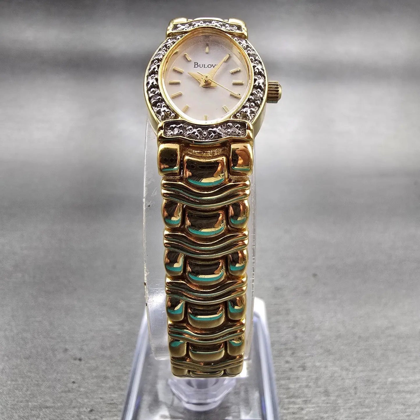 Bulova Watch Women 16mm Ivory Dial Gold Tone Gemmed Oval 98R37 New Battery5