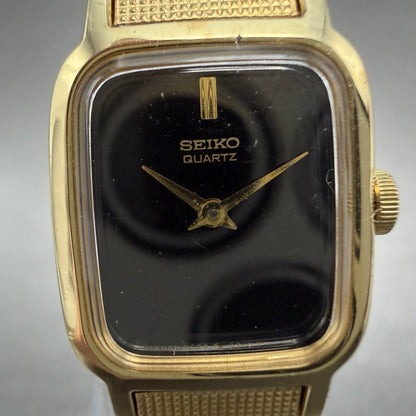 Seiko Tank Watch Women 16mm Black Dial Gold Tone Rectangle 2C20-5329 New Battery1