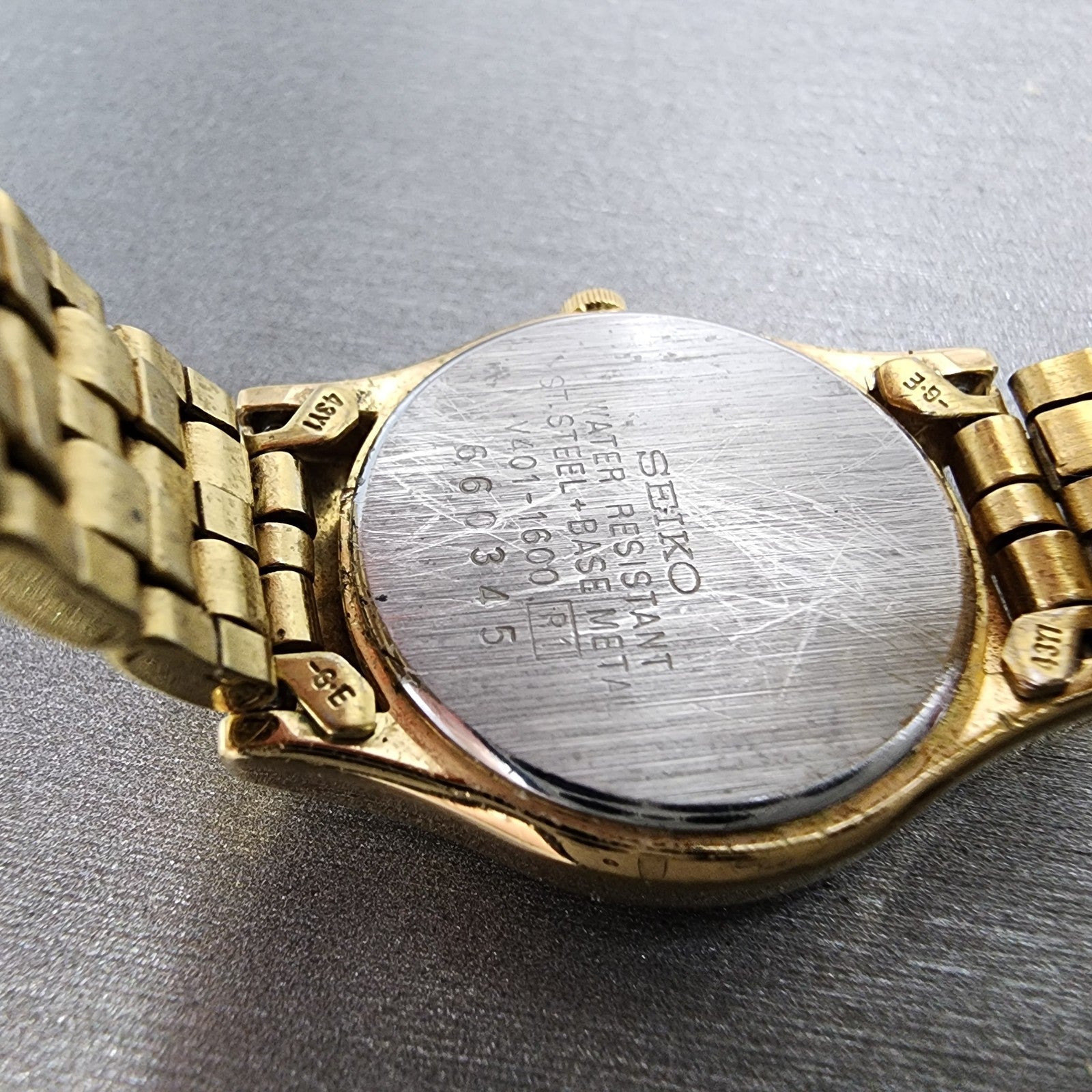 Seiko watch Women 24mm Black Dial Gold Tone Round V4011600 New Battery9