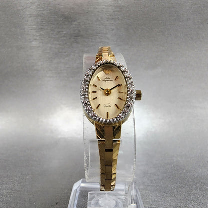 Jules Jurgenson Watch Women 15mm Gold Dial Gold Tone Oval Gem Set Bezel Runs5