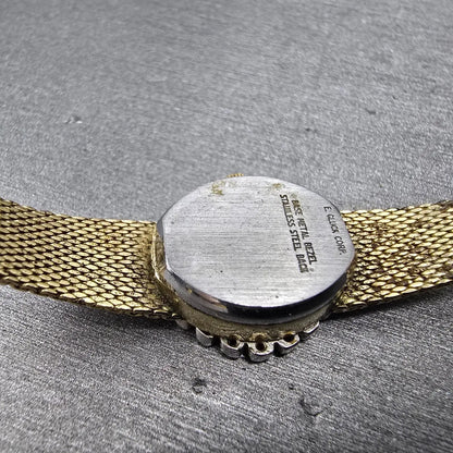 Armitron Watch Women 15mm Cream Dial Gold Tone Diamond bezel Oval New Battery9