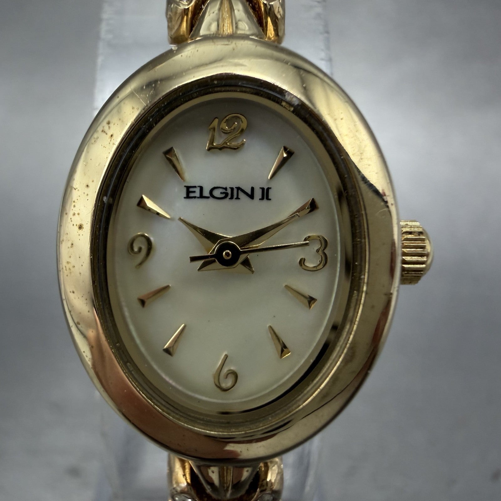 Elgin Watch Women 18mm MOP Dial Gold Tone Oval Ruby Diamond Bezel New Battery1